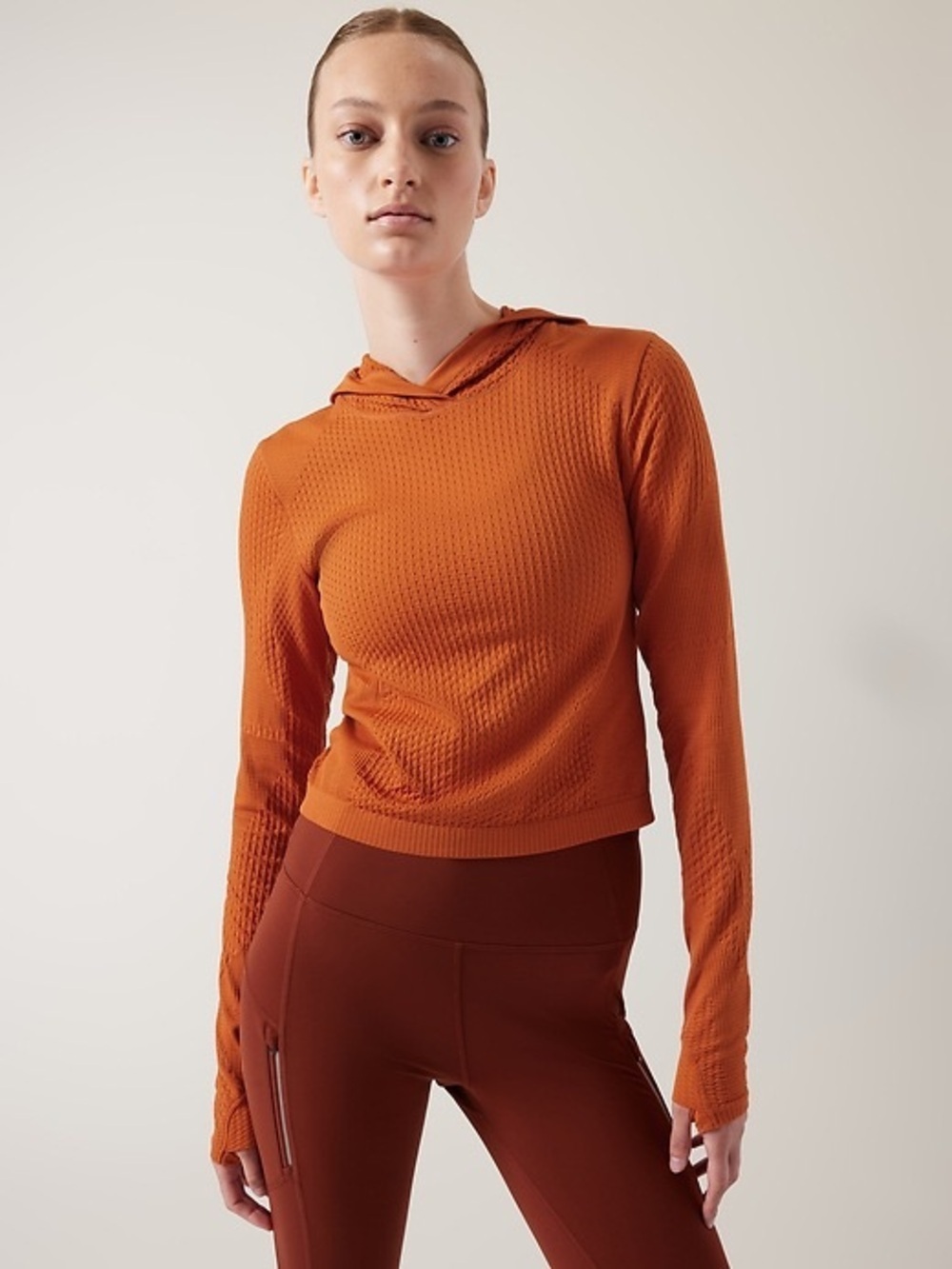 Athleta Flurry Seamless Cropped Hoodie Burnt Orange Thumbholes XS Athleisure
